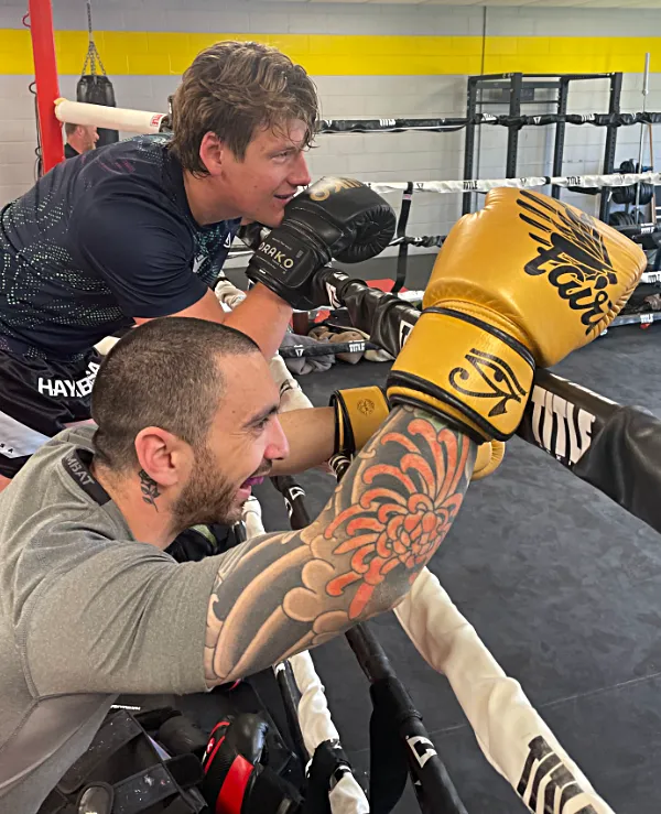 Two CJ Martial Arts black belts
